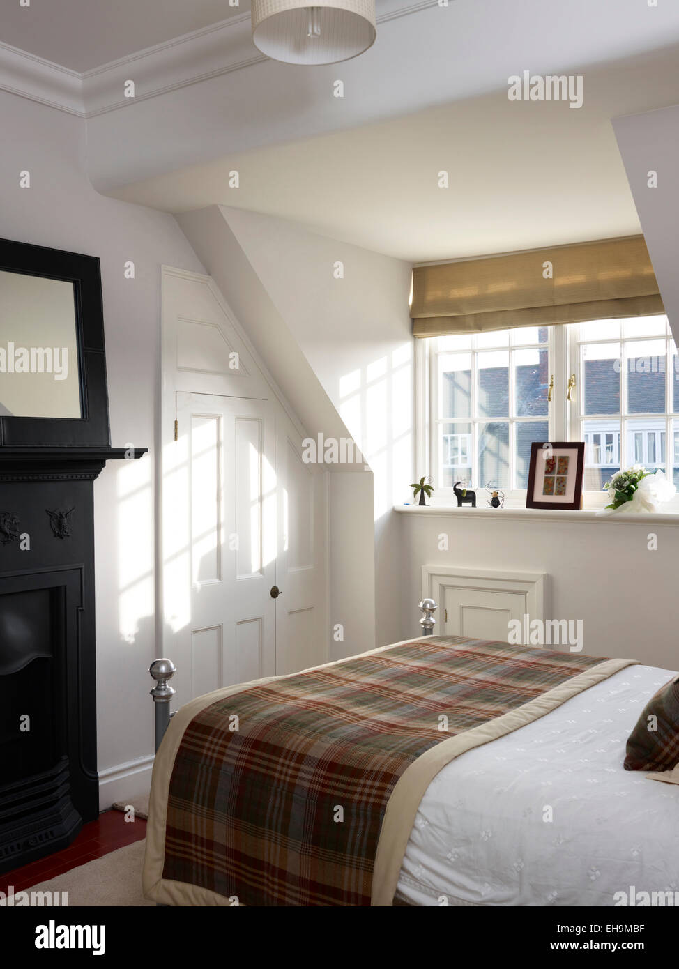 Bedroom Dormer Window Fireplace And Tartan Blanket Residential