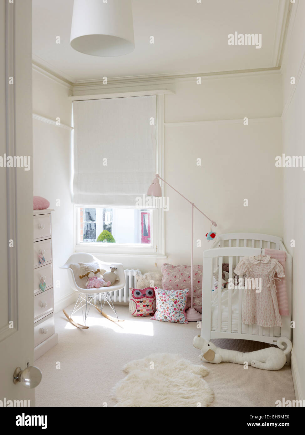 White nursery with cot, residential house, Port Hall Street, Brighton, East Sussex, UK Stock Photo
