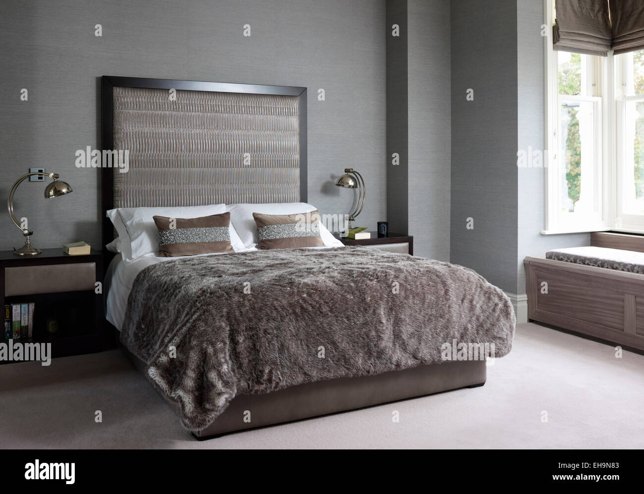 Double bed with matching side tables and lamps with oversized