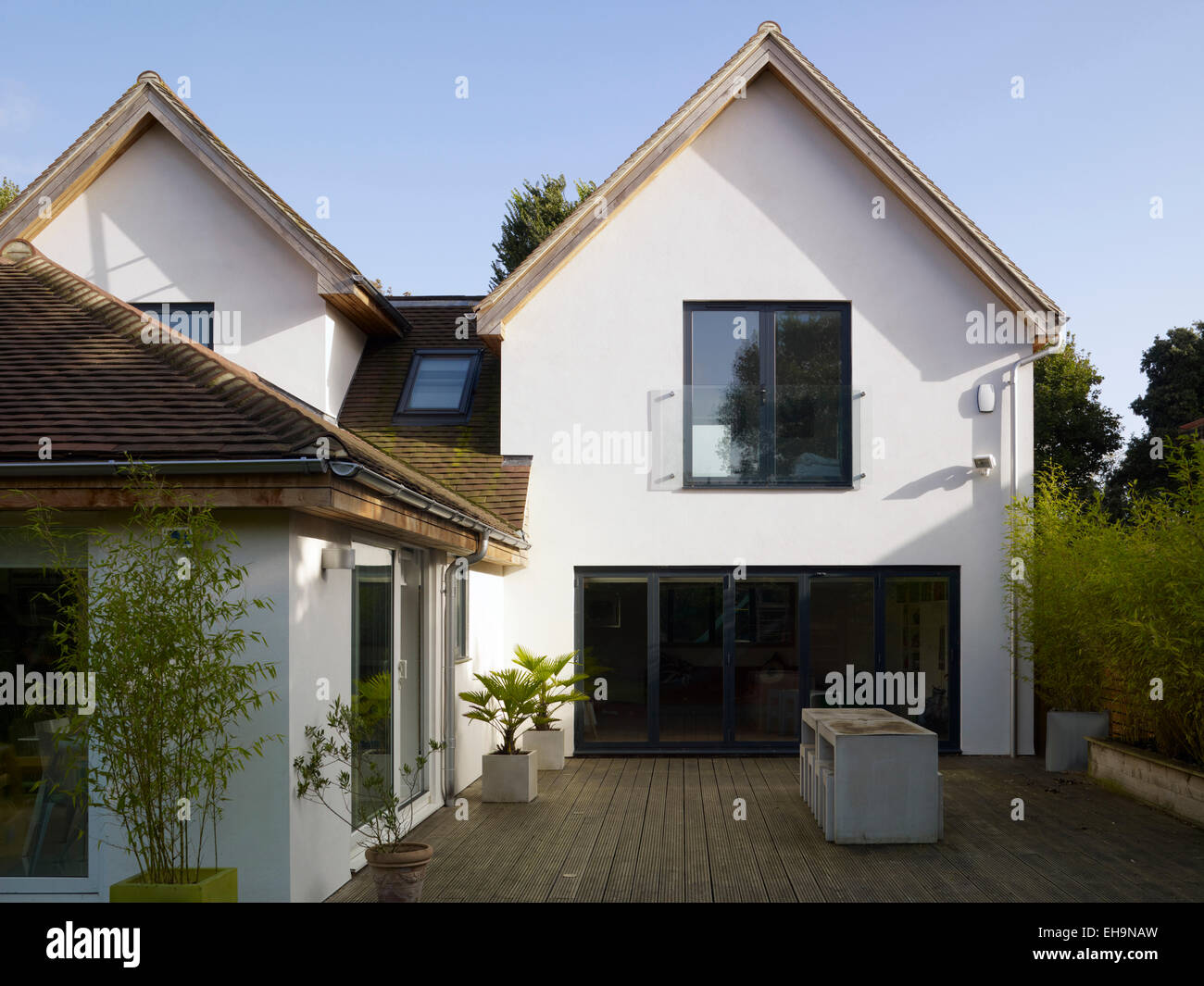 Exterior facade with decking and planters in Radinden Manor Road home, UK Stock Photo