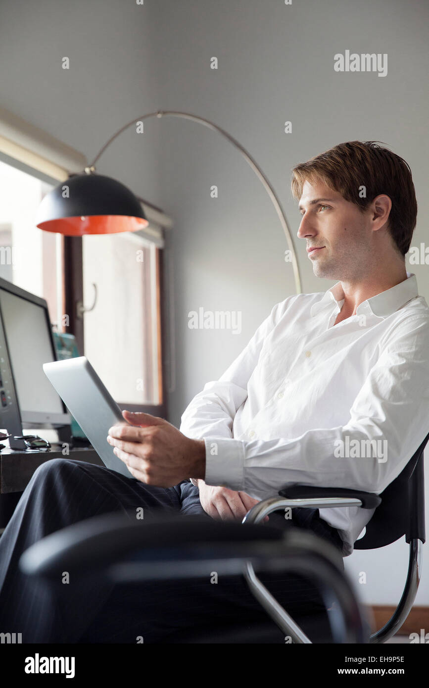Businessman using digital tablet Stock Photo