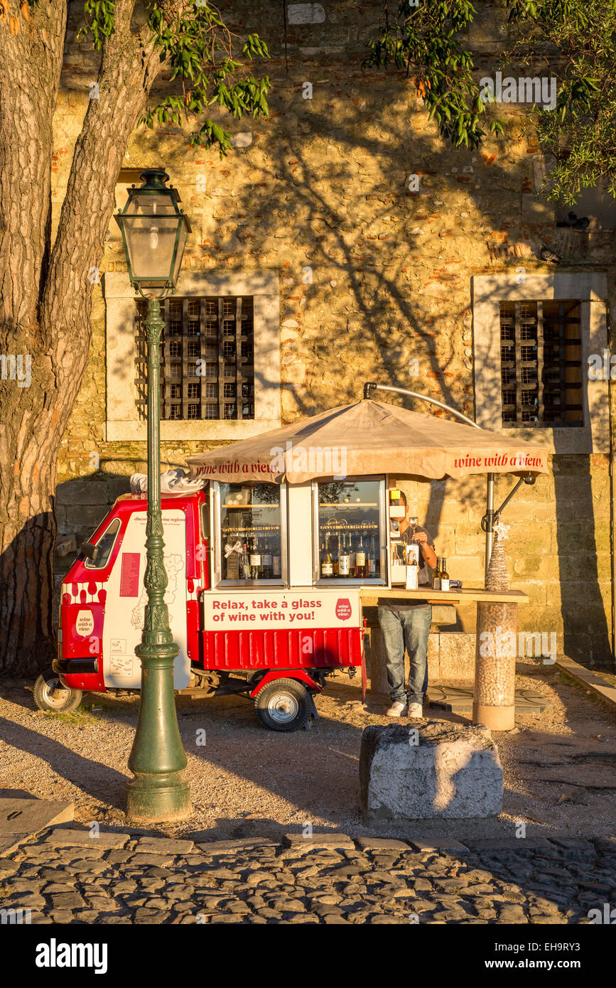 wine seller selling glasses of wine from a tuk tuk, at top of castel hill, Nice, France Stock Photo