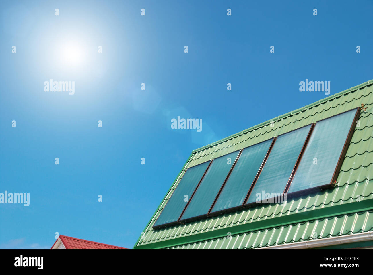 Solar water heating system on the roof Stock Photo - Alamy