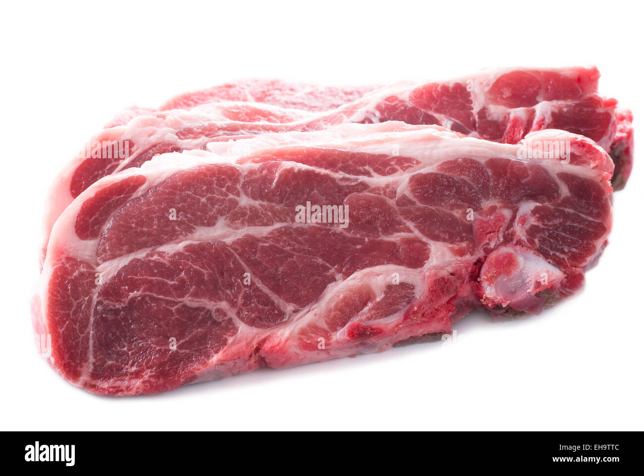 Loin of pork on white background. Stock Photo