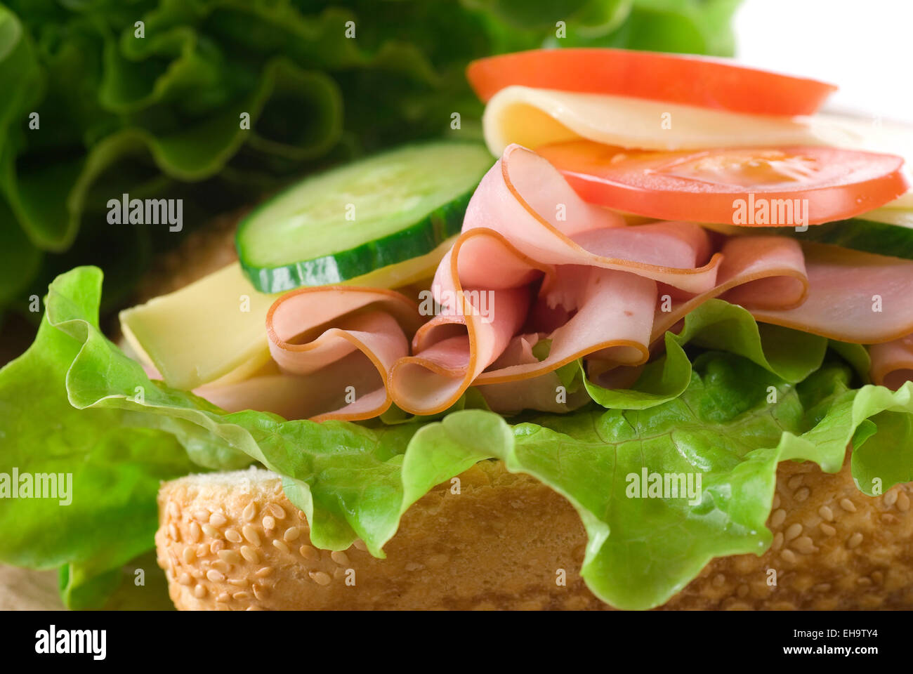 Ham, tomato, cucumber sandwich. Stock Photo