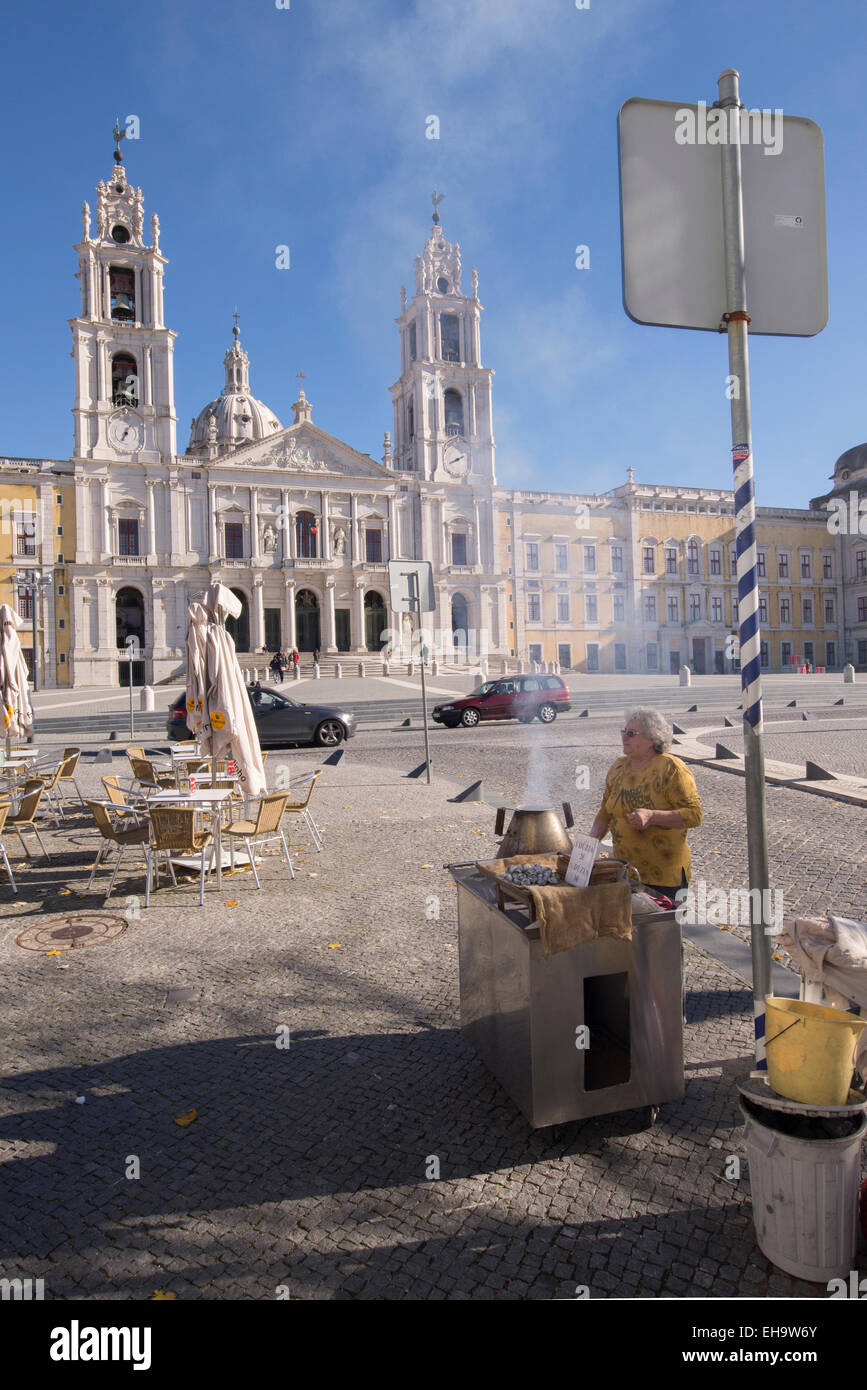 The Mafra National Palace is a monumental Baroque and Italianized Neoclassical palace-monastery located in Mafra, Stock Photo