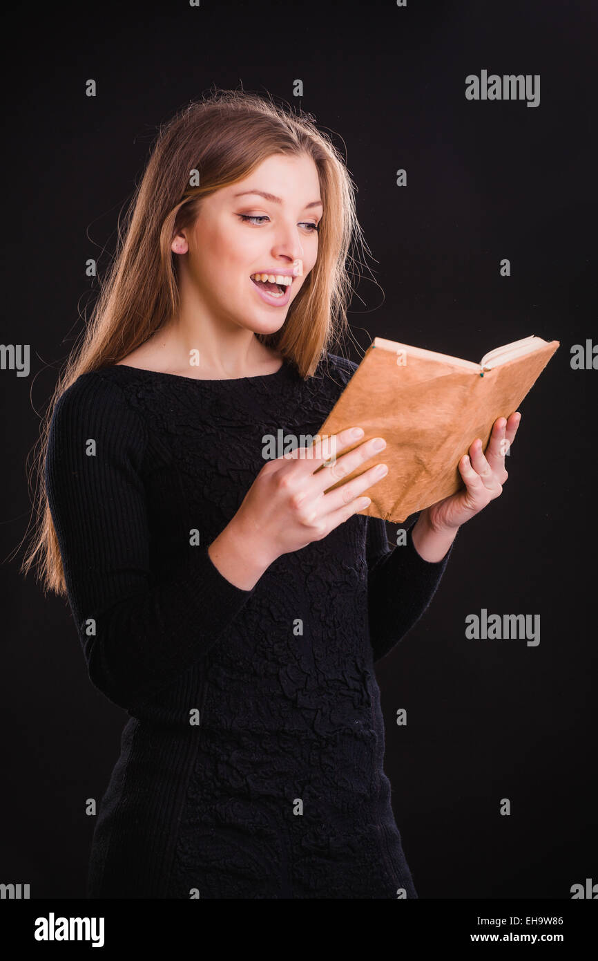 Pretty woman with book Stock Photo