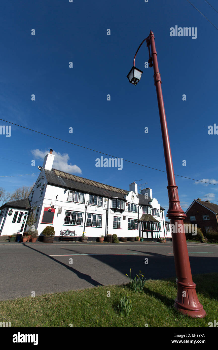 Village of Handley, England. Spring view of Handley’s Calveley Arms