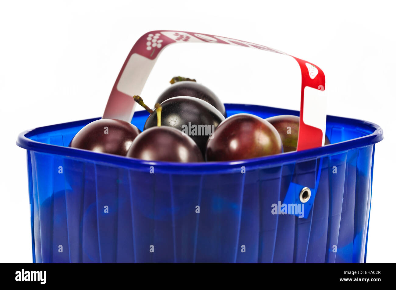 a basket bowl of fresh plums Stock Photo