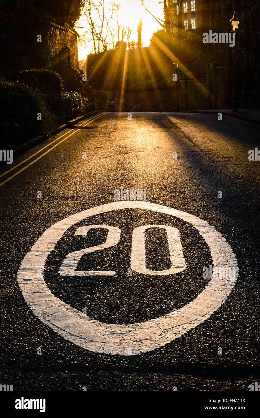 A 20 MPH road speed restriction sign painted on road. Castle Entrance to The Park Estate, Nottingham. On 7th March 2015. Stock Photo