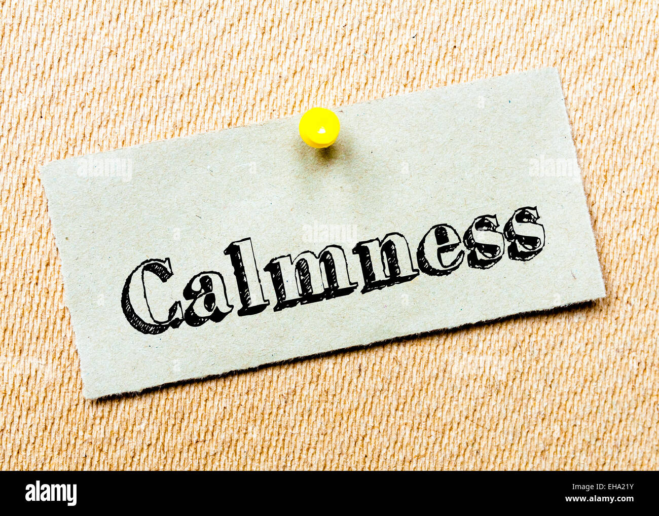 Recycled paper note pinned on cork board. Calmness Message. Concept Image Stock Photo