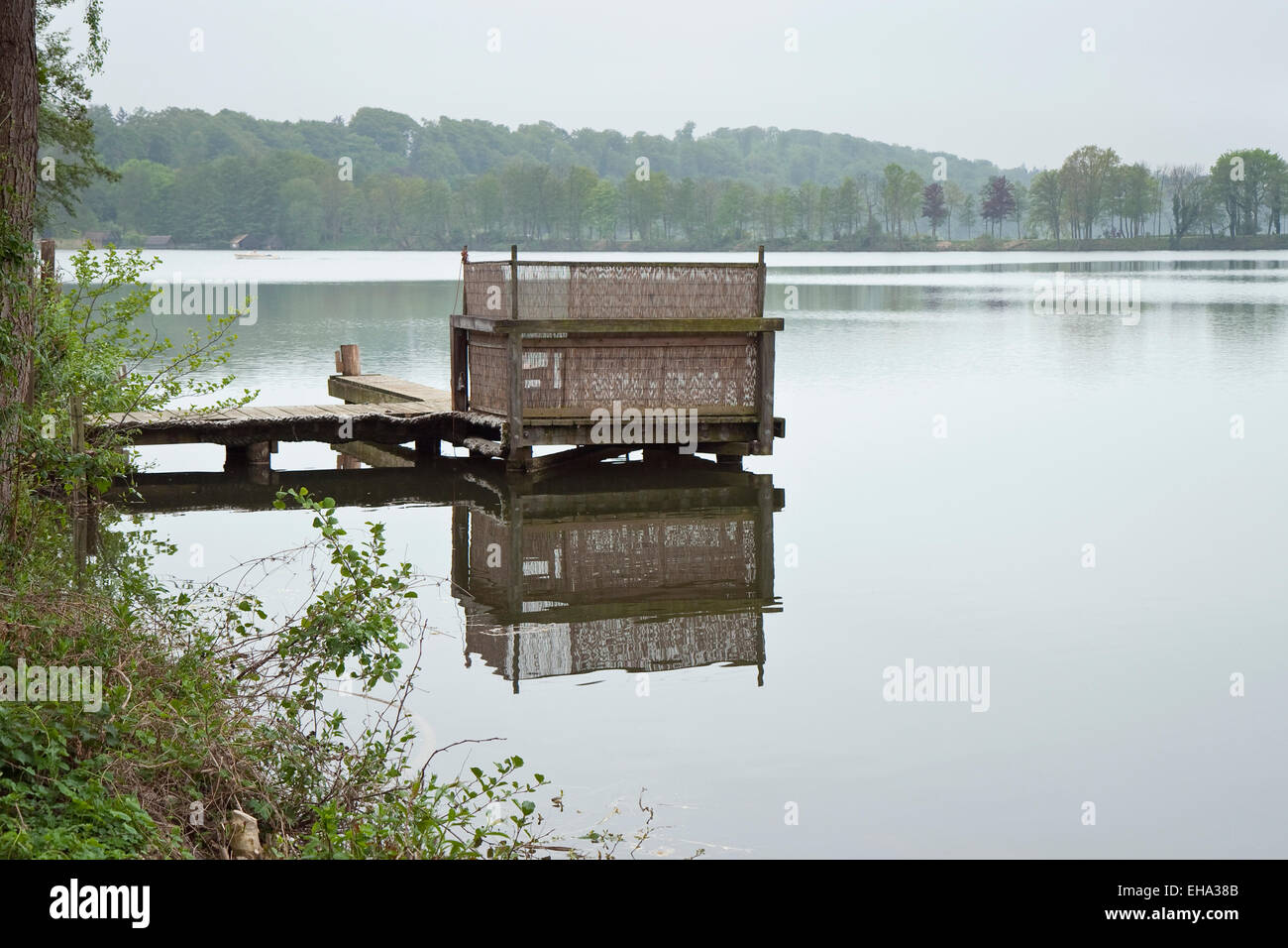 Small bathing jetty in a lake at Ratzeburg, Germany Stock Photo
