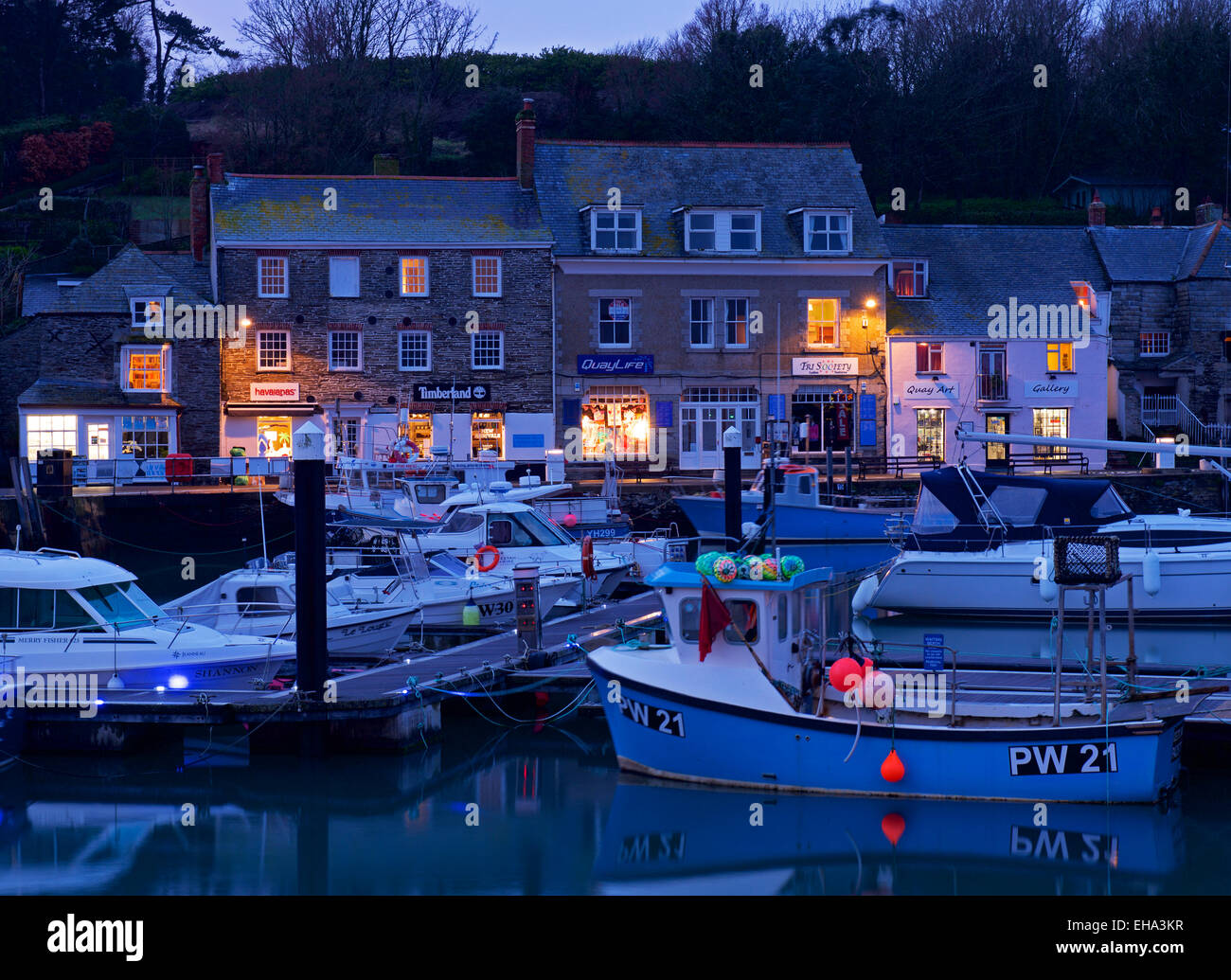 Boats in the harbour at night, Padstow, Cornwall, England UK Stock Photo