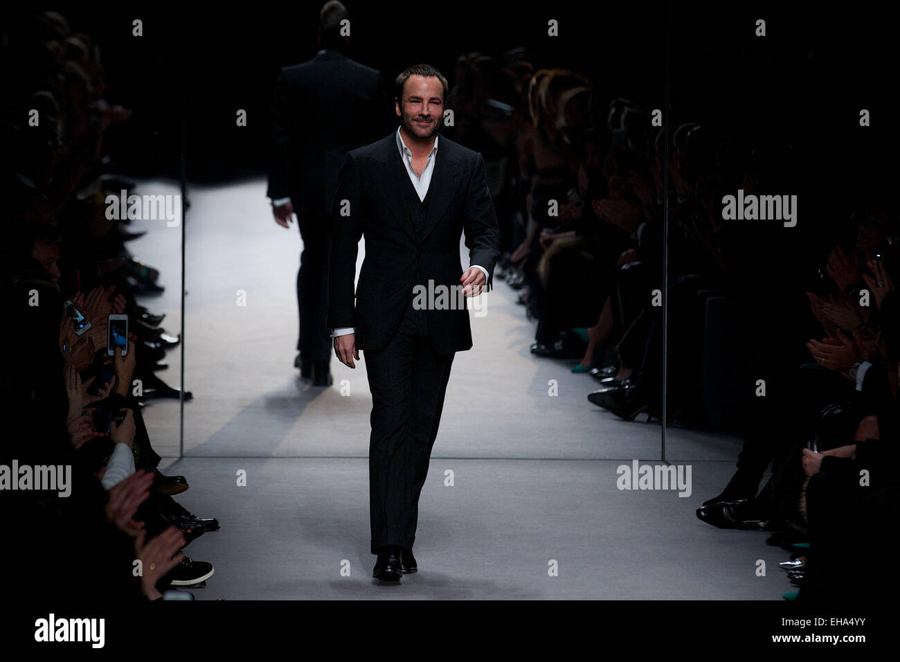 UNITED KINGDOM, London : Designer Tom Ford thanks the audience at the end of his shown during the 2014 Autumn / Winter London Fashion Week in London on February 17, 2014. Stock Photo