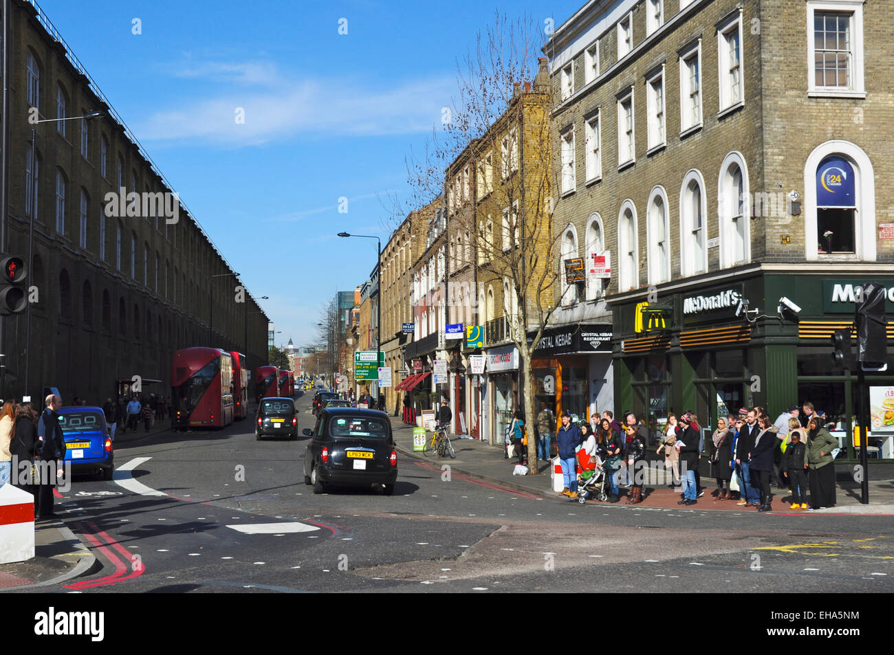 Busy road junction, York Way corner with Pentonville Road, King's Cross, London, England, UK Stock Photo