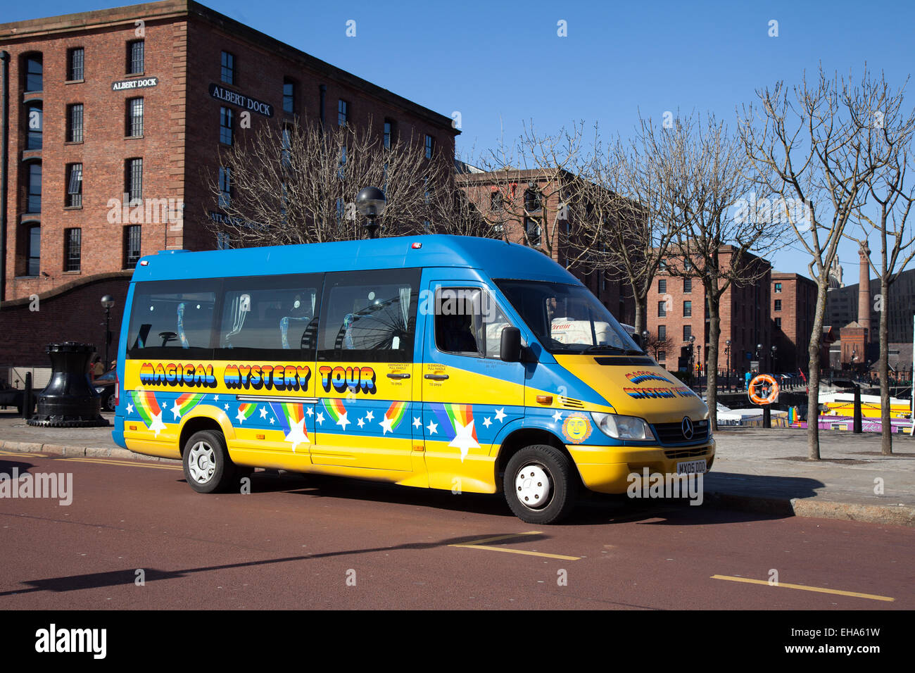 Beatlmania PSV, Liverpool, Merseyside, UK. 10th March, 2015.  UK Weather.  Magical Mystery Tour Bus  Bright Spring Sunshine in Liverpool as Tourist attractions gear up for an influx of foreign tourists. Stock Photo