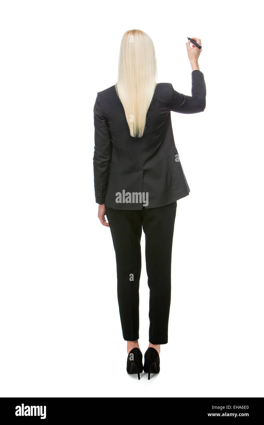 turned back blonde businesswoman writing with a marker pen Stock Photo