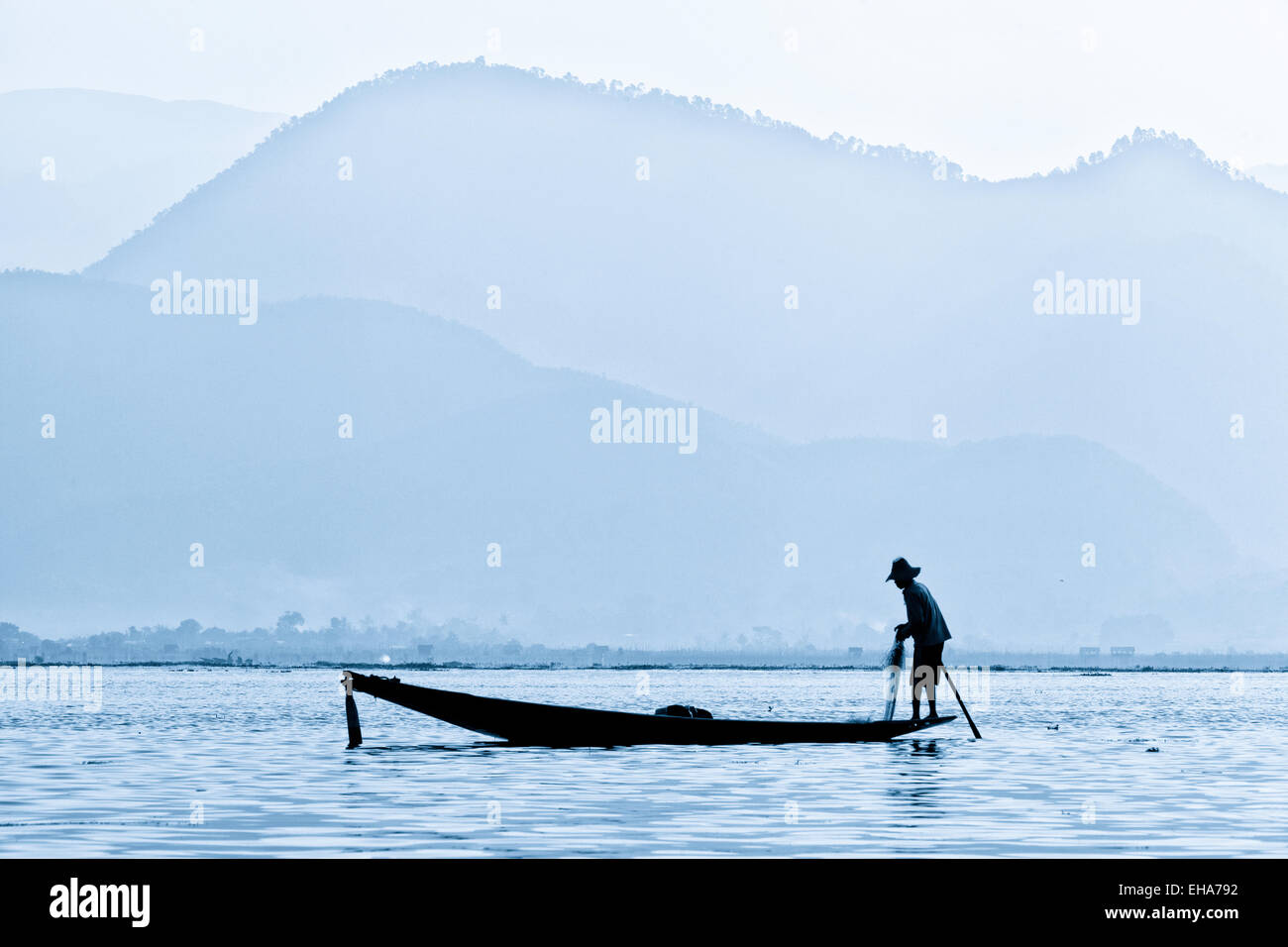 Net fisherman fishing at dawn, Inle Lake, Myanmar ( Burma ), Asia Stock Photo