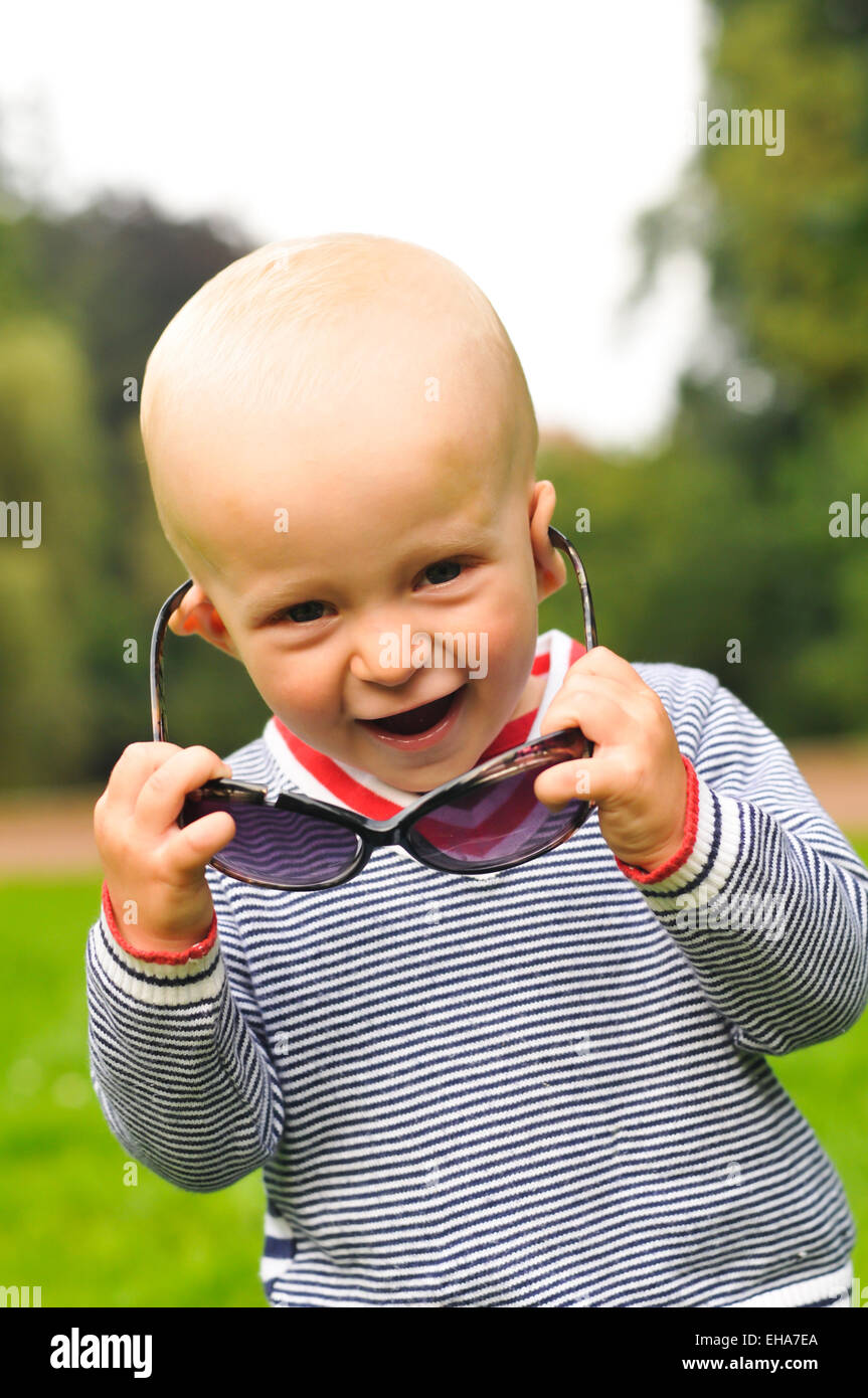 Little boy portrait closeup smiles and looking at camera Stock Photo ...
