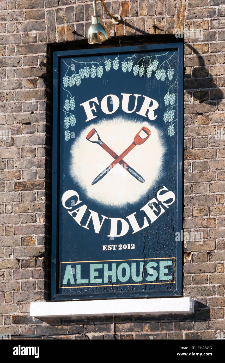 Sign for the Four Candles pub in Broadstairs, the name inspired by the Two  Ronnies comedy sketch Stock Photo - Alamy