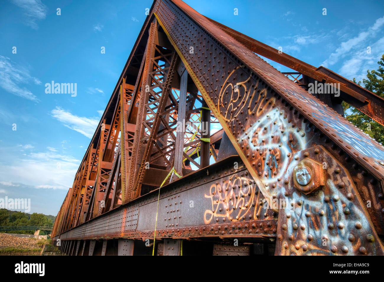 Graffiti On Old Rusty Train Bridge Stock Photo