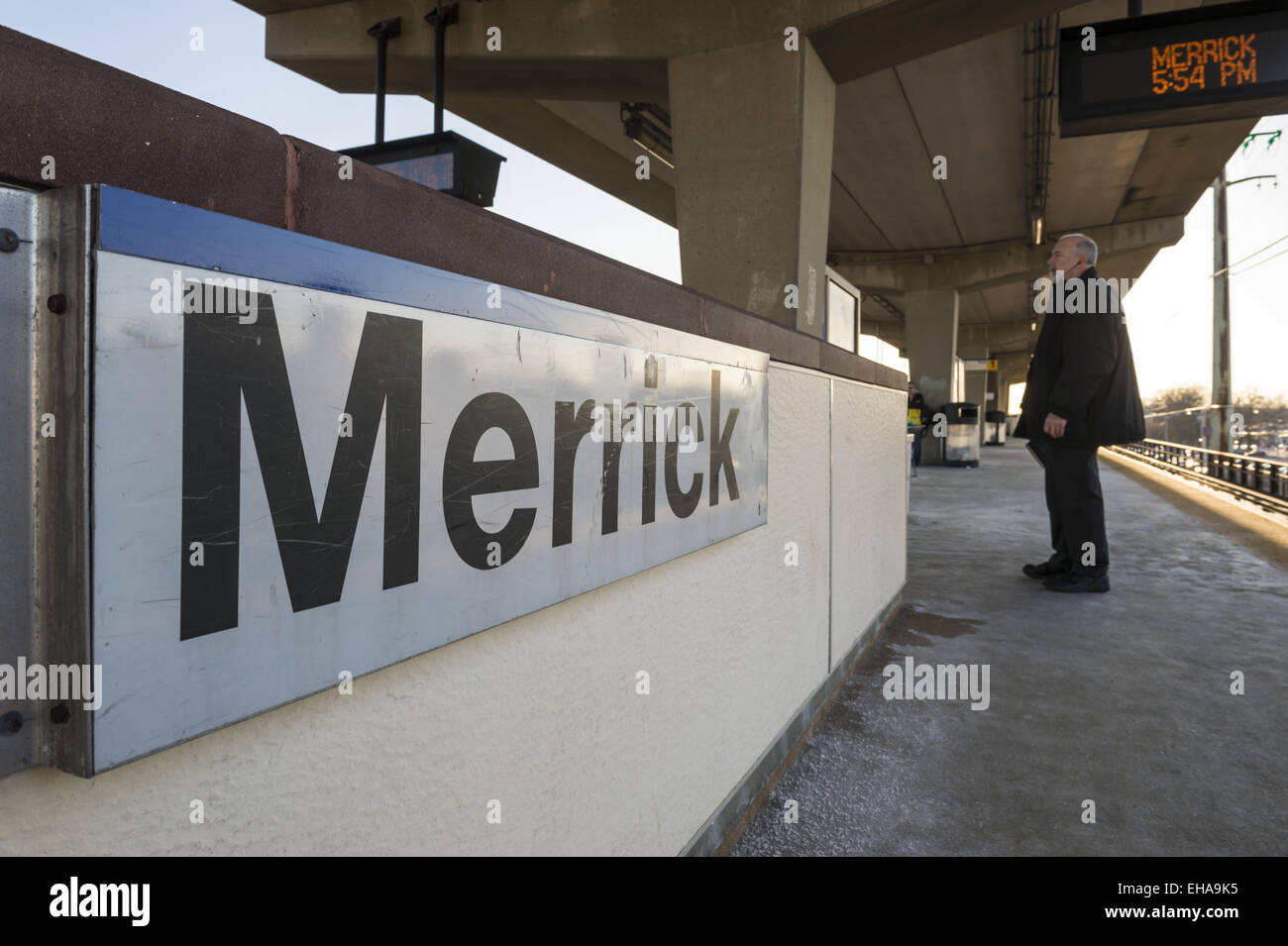 Merrick, New York, USA. 9th Mar, 2015. A man waits on the elevated