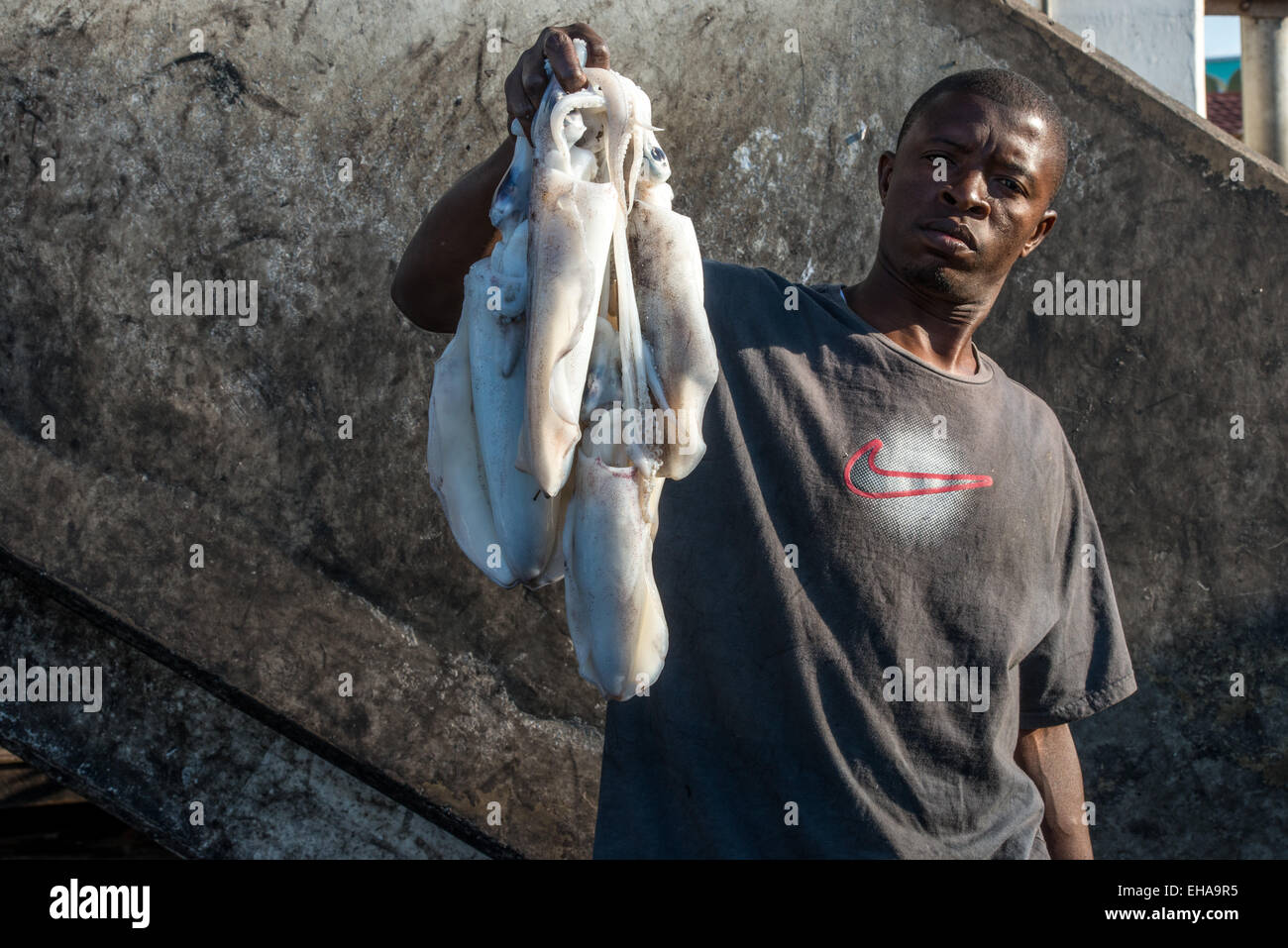 Dar Es Salaam, Fish Market, Young Man With Fish Stock Photo
