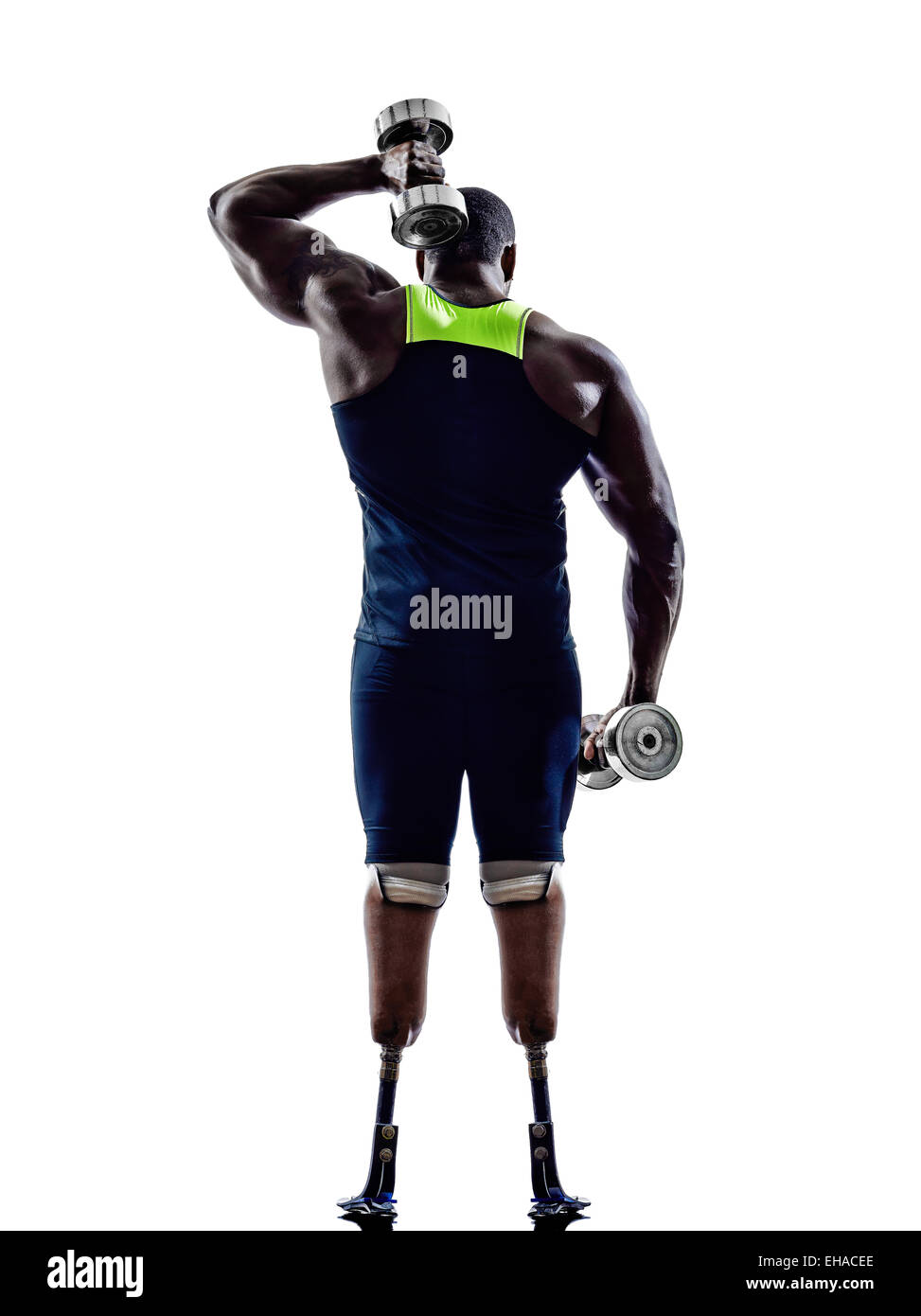 one muscular handicapped man body builders building weights with legs prosthesis in silhouette on white background Stock Photo