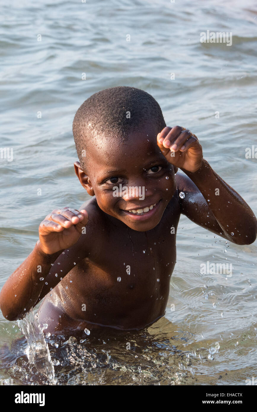 Lake Tanganyika, Boy At Fishermen's Village Stock Photo