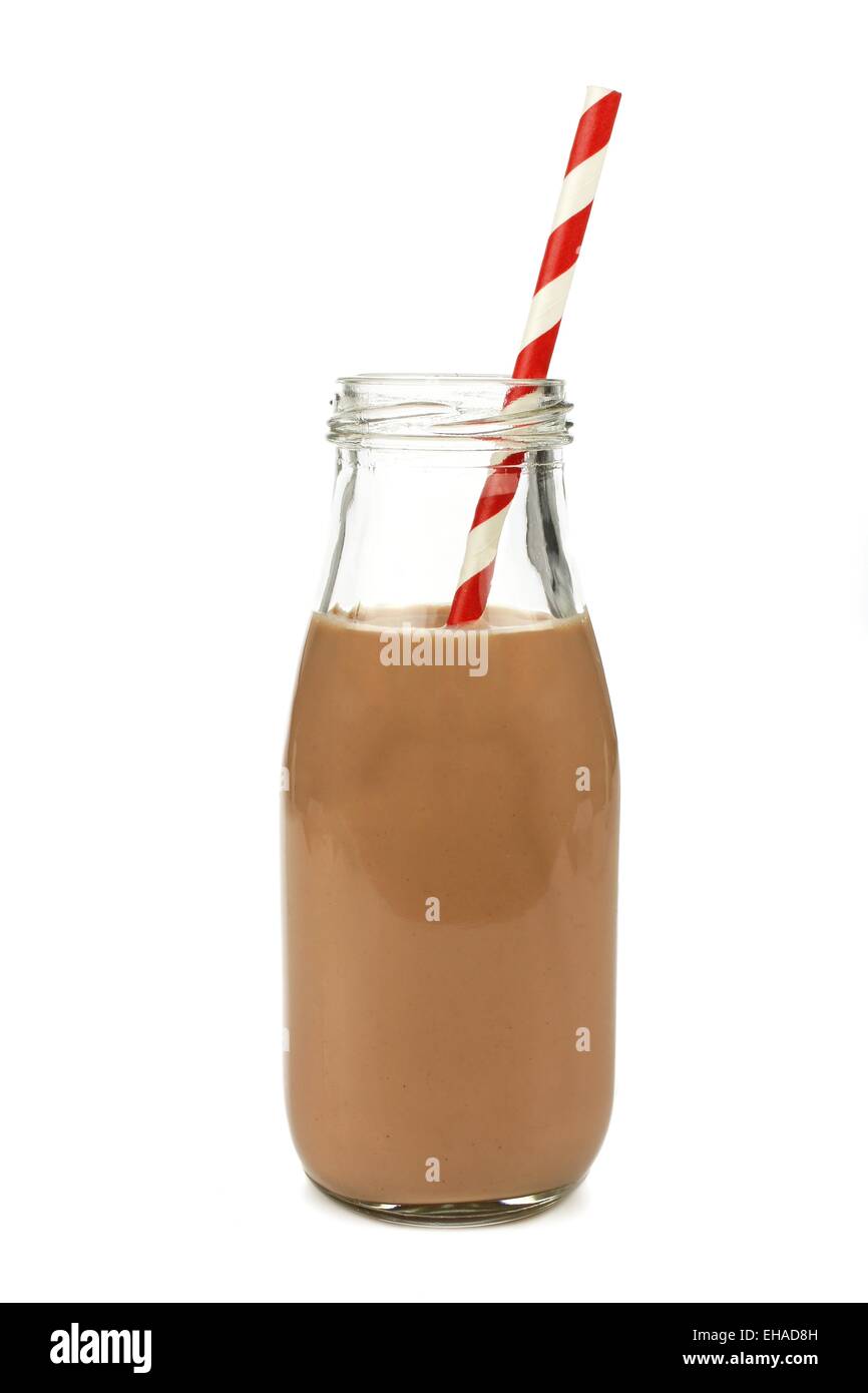 Chocolate milk with straw in a traditional bottle isolated on white Stock Photo