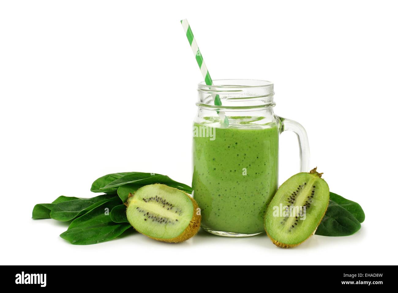 Healthy green smoothie with spinach and kiwi in a jar mug isolated on white Stock Photo