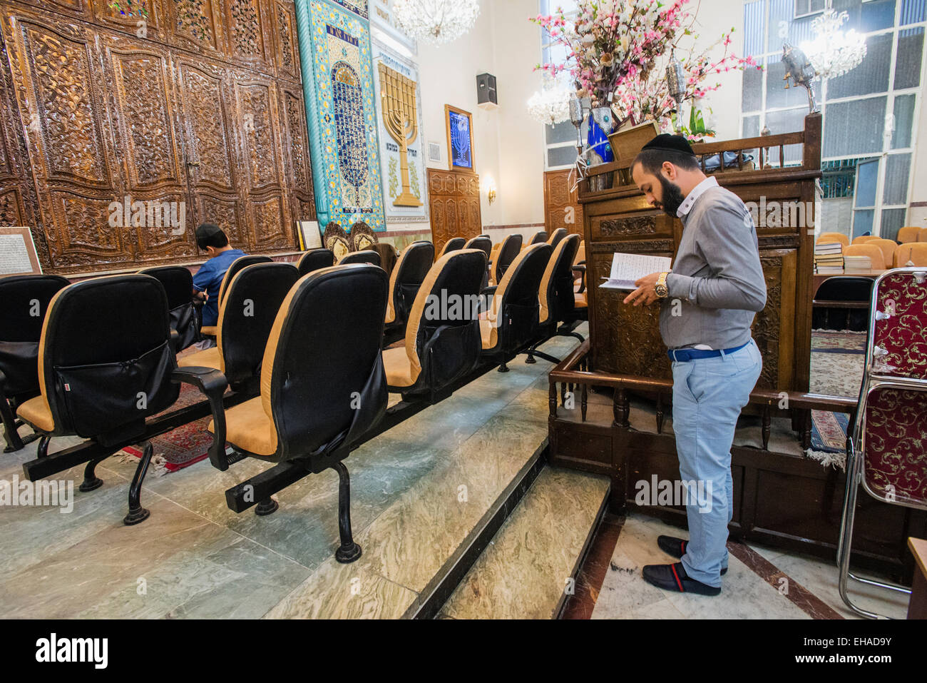 Young Jew prays on Rosh Hashanah, Jewish New Year, in Yusef Abad