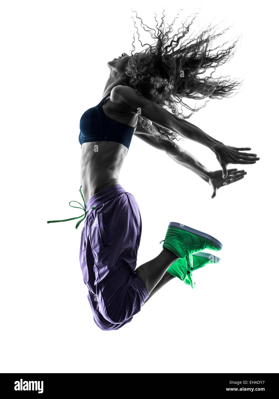 one african woman woman zumba dancer dancing exercises in studio silhouette isolated on white