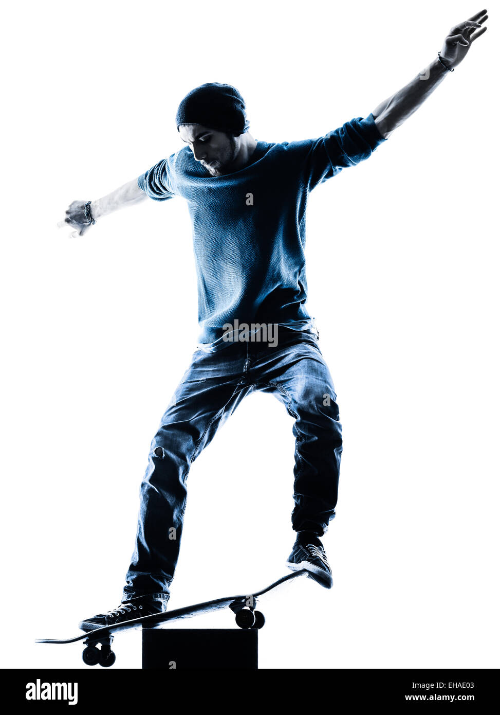 one caucasian man skateboarder skateboarding  in silhouette isolated on white background Stock Photo