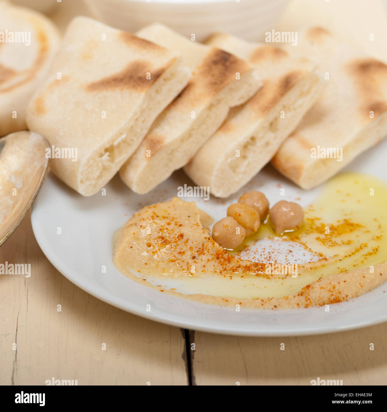 traditional chickpeas Hummus with pita bread and paprika on top Stock ...