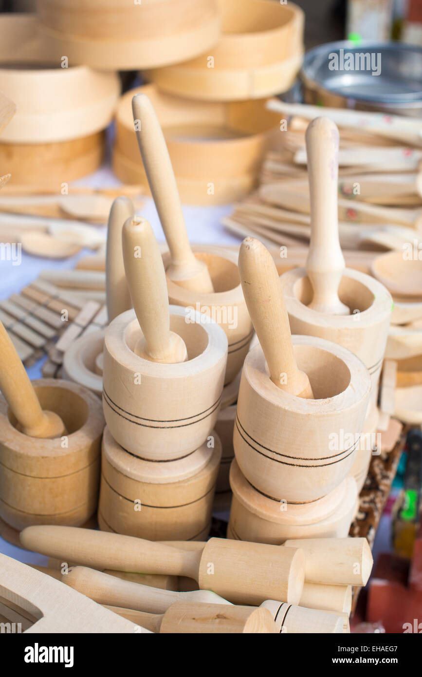 Wooden mortars and pestles for sale at a market stall Stock Photo Alamy