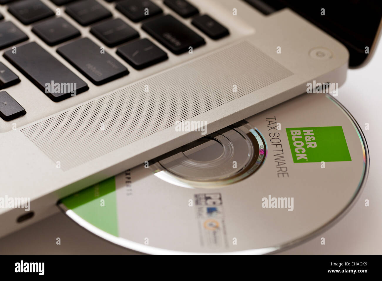 H&R Block tax software disc in laptop computer - USA Stock Photo