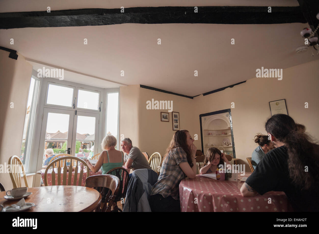 Customers indoors at the River Tea Rooms in Saint Ives, Cambridgeshire. Stock Photo
