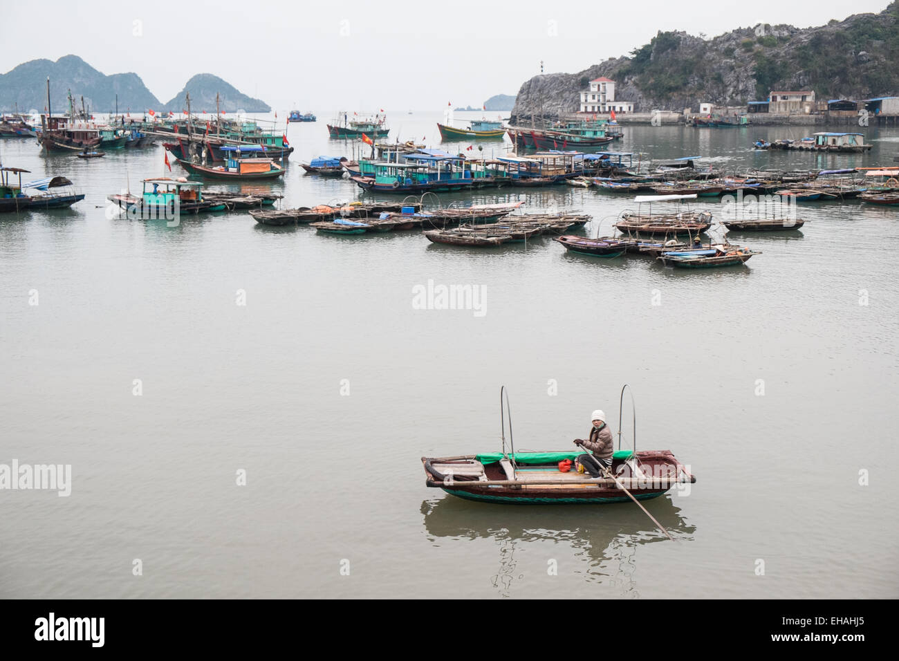 Waterfront and local rowing boat at Cat Ba Island, Cat Ba National Park