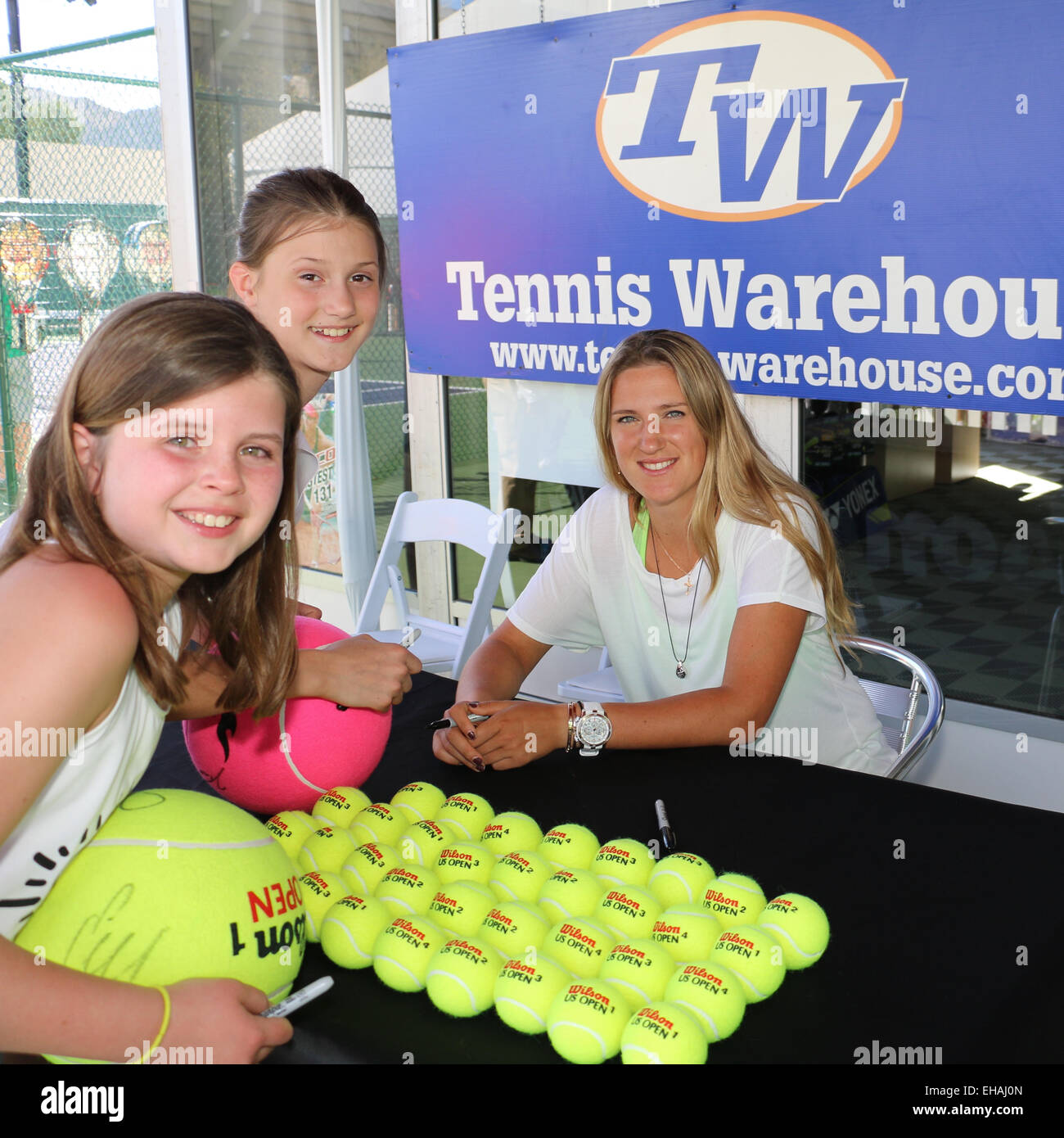 Indian Wells, California 10th March, 2015 Tennis player Victoria Azarenka from Belarus signs autographs for Lane Harding (age 11) and Elise Williamson (age 11) both from Richmond, Virginia at the BNP Paribas Open. Credit: Lisa Werner/Alamy Live News Stock Photo