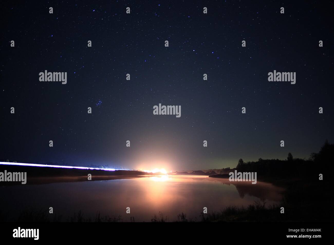 starry night sky landscape lake Stock Photo