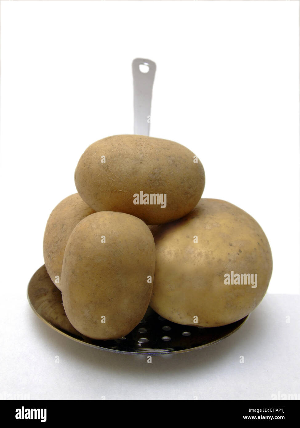 Eine Kelle Kartoffeln / potatoes Stock Photo