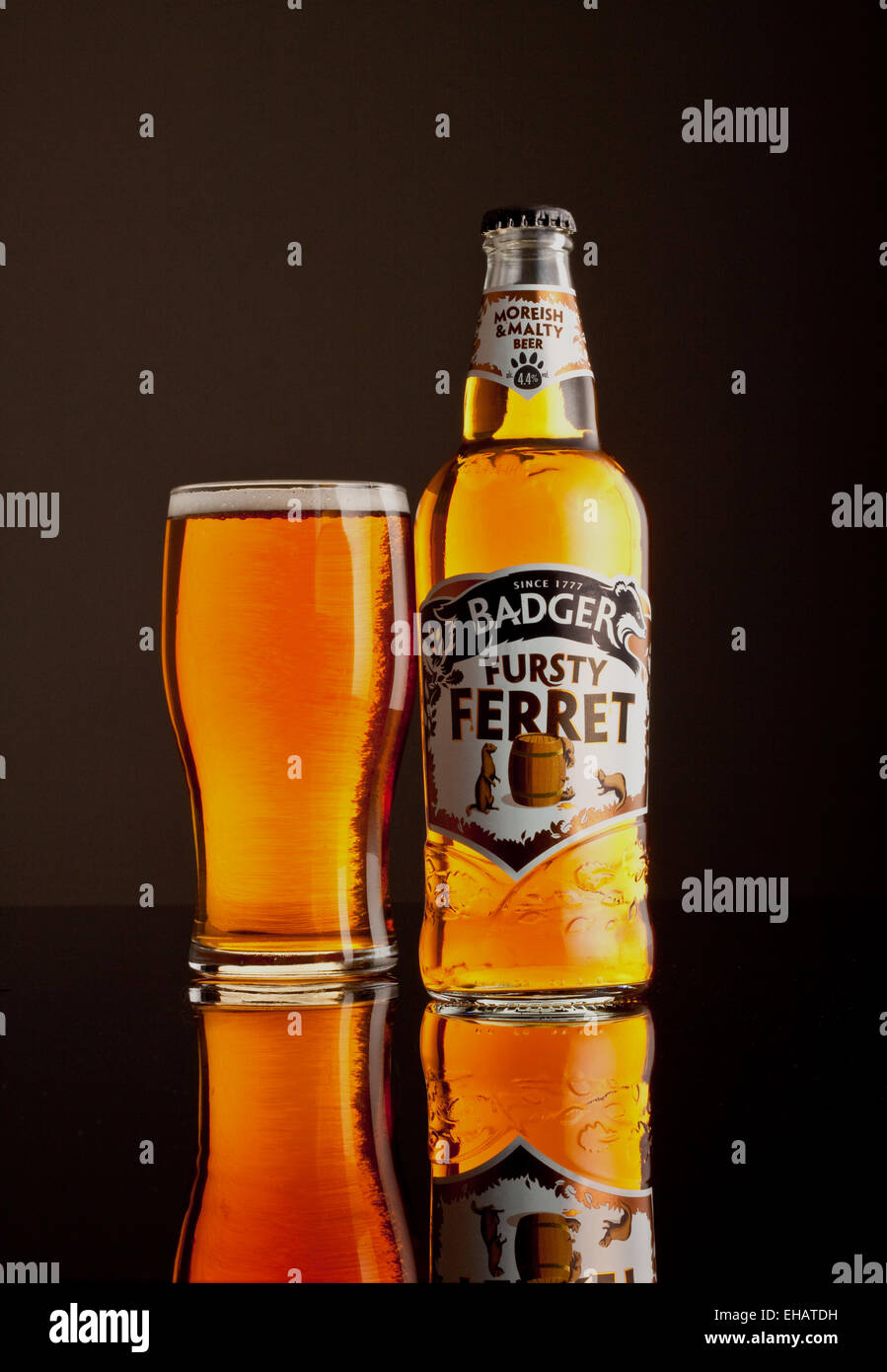 Bottle of Ale with a poured pint glass Stock Photo