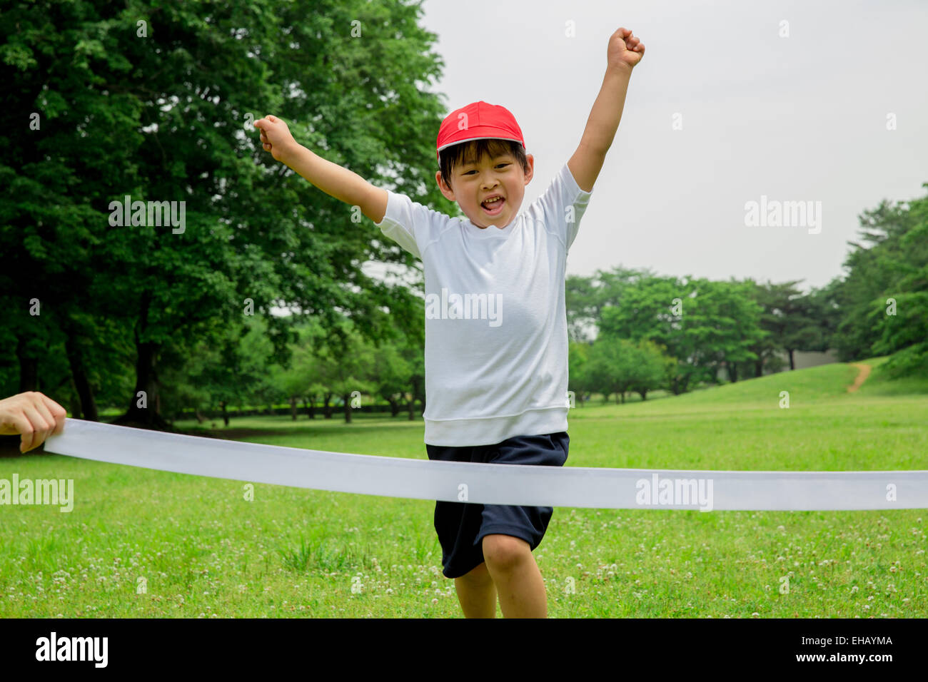 Japanese kid running in a park Stock Photo Alamy