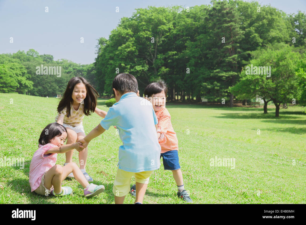 Japanese kids playing in a park Stock Photohttps. 