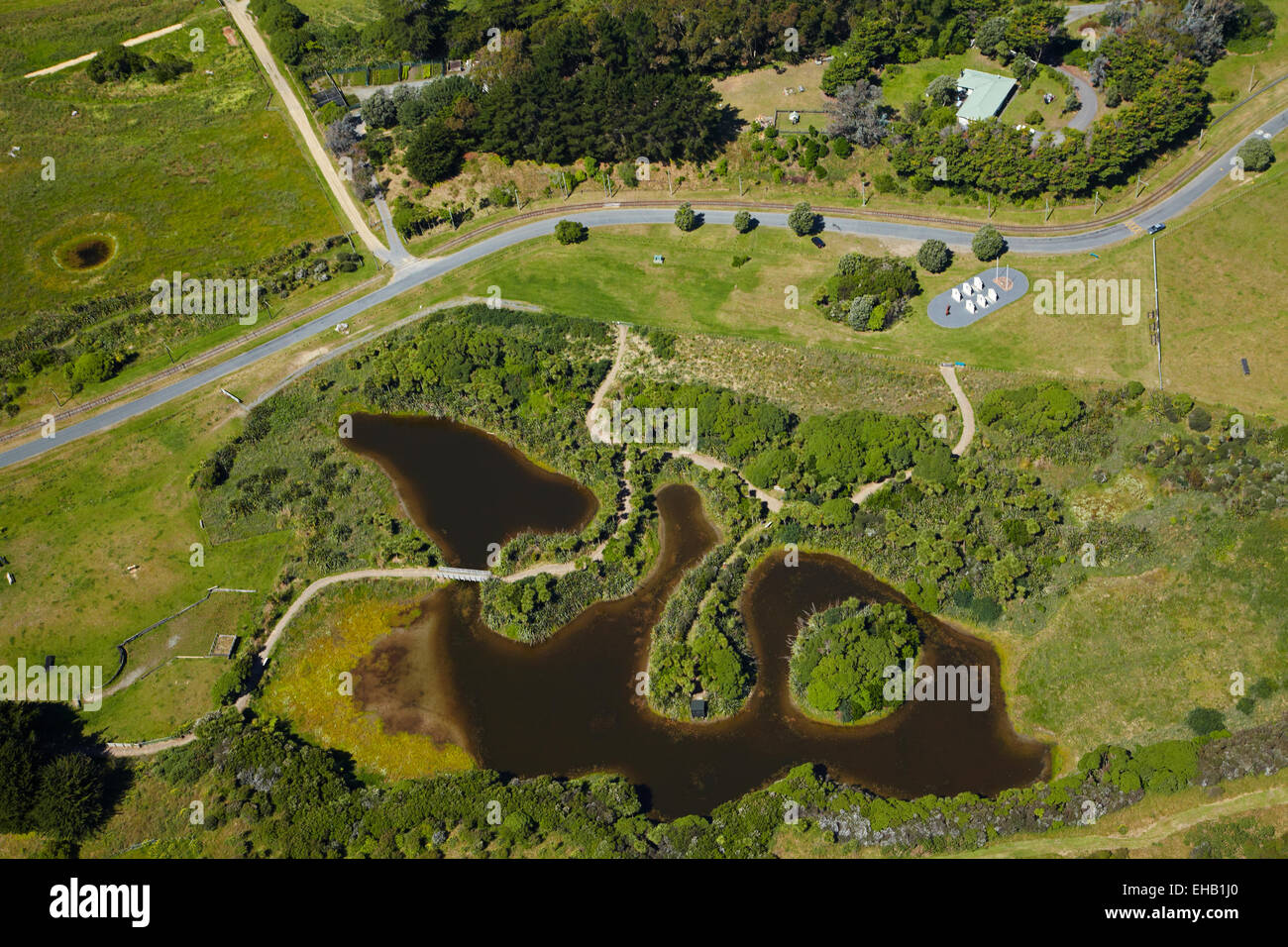 Wetland at Queen Elizabeth Park, and US Marines Memorial, Paekakariki, Kapiti Coast,  Wellington, North Island, New Zealand - aerial Stock Photo