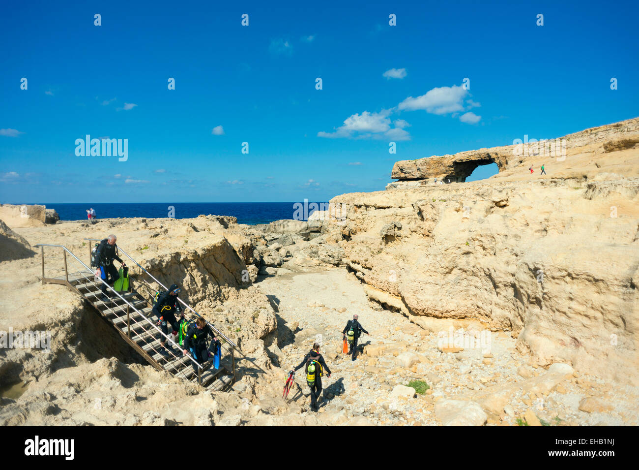 Mediterranean Europe, Malta, Gozo Island, Dwerja Bay, The Azure Window natural arch, scuba divers at the Blue Hole Stock Photo