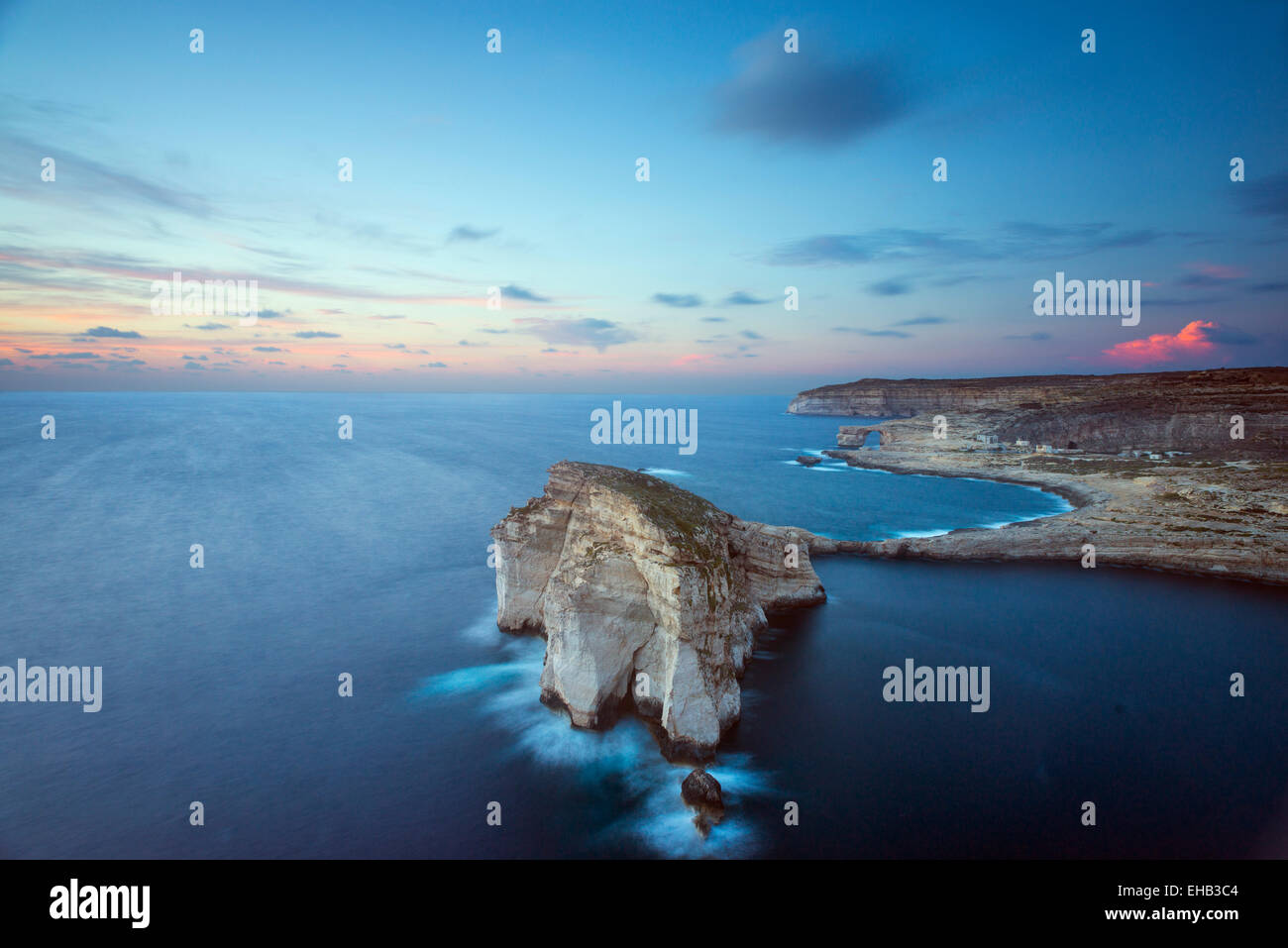 Mediterranean Europe, Malta, Gozo Island, Dwerja Bay,  Fungus Rock  and The Azure Window natural arch Stock Photo