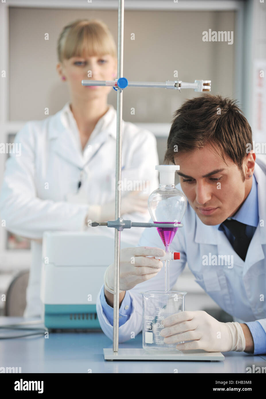 Science Help People science people in bright lab Stock Photo - Alamy
