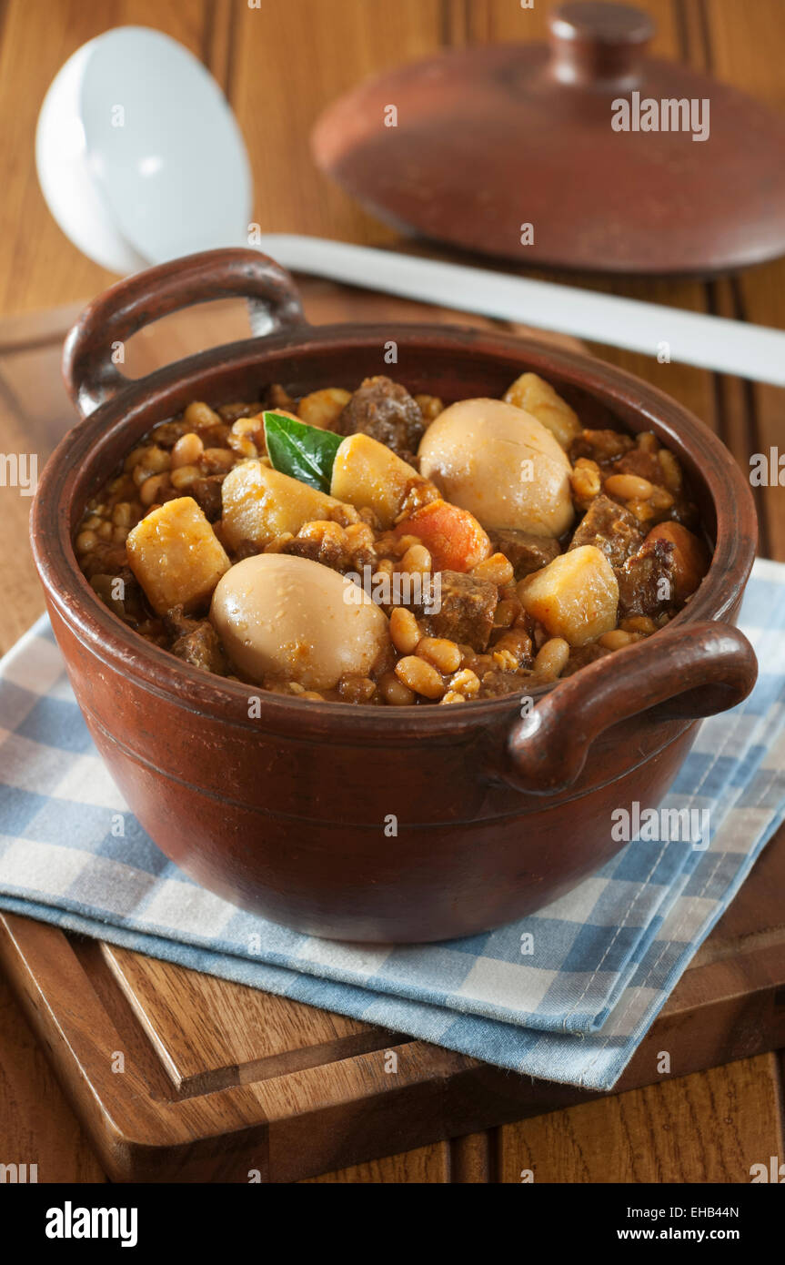 Cholent. Potato, meat, bean and barley stew. Jewish Food Stock Photo